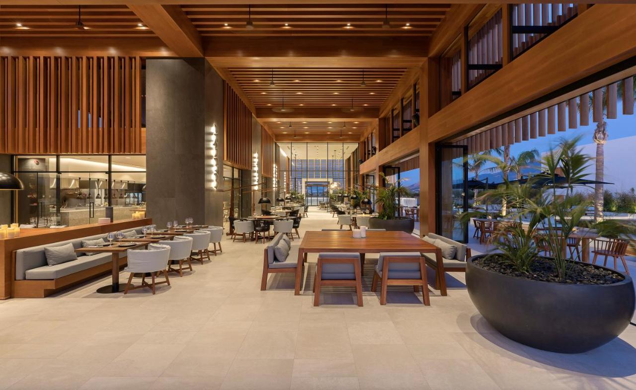 D' Andrea Lagoon All Suites - Adults Only Marmari  Bagian luar foto The restaurant at the hotel