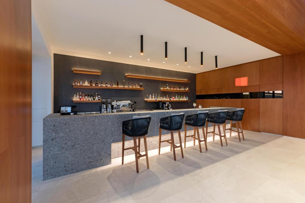 D' Andrea Lagoon All Suites - Adults Only Marmari  Bagian luar foto The bar at the lounge