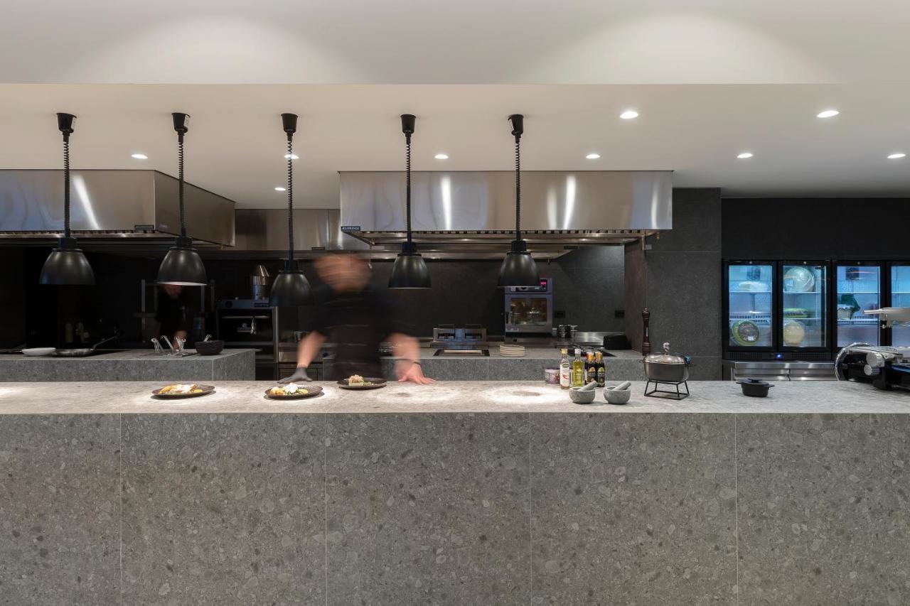 D' Andrea Lagoon All Suites - Adults Only Marmari  Bagian luar foto The open kitchen at the restaurant