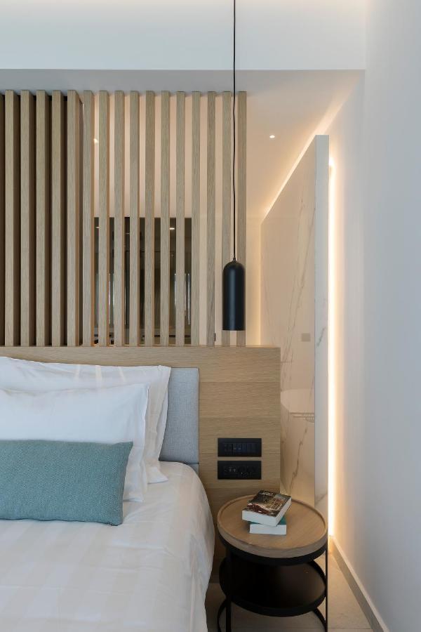 D' Andrea Lagoon All Suites - Adults Only Marmari  Bagian luar foto A detail of the interior of a room at the hotel