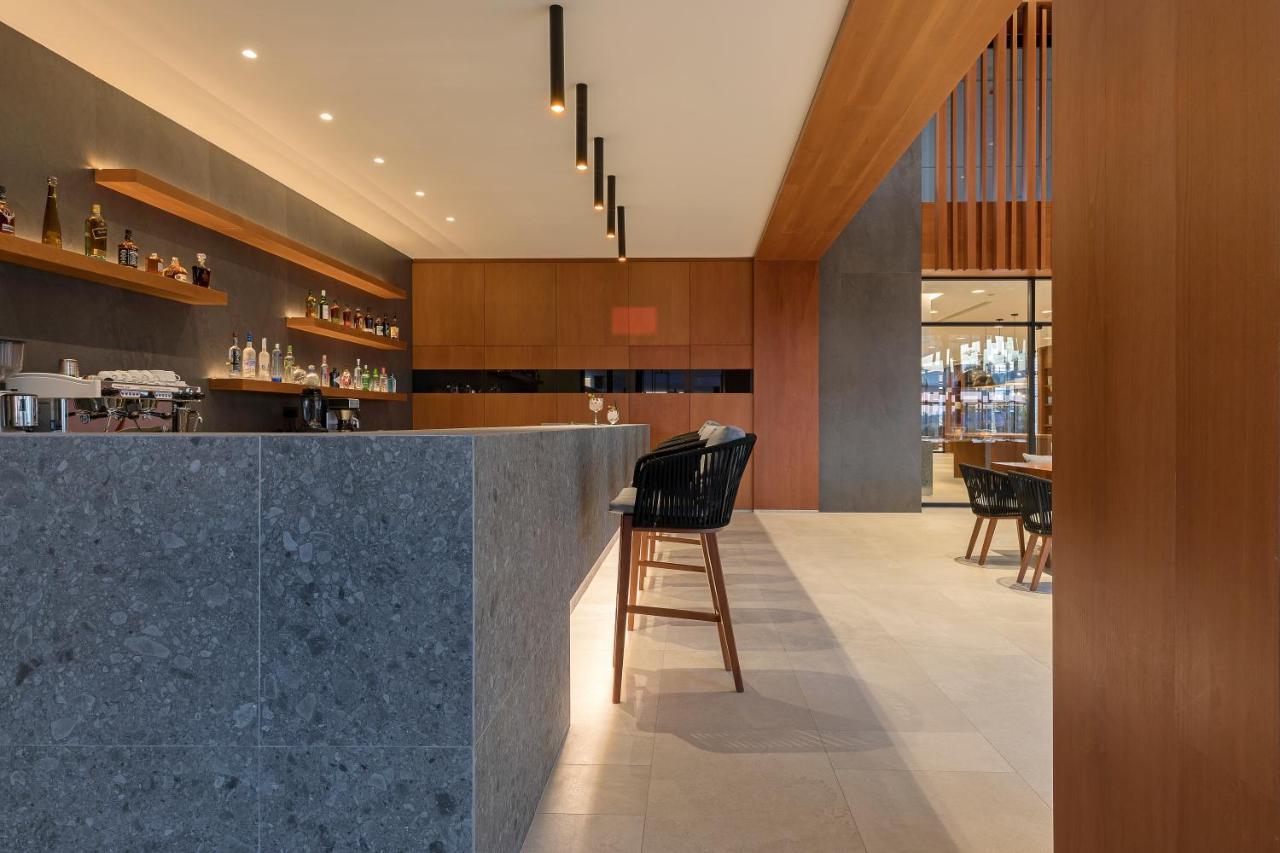D' Andrea Lagoon All Suites - Adults Only Marmari  Bagian luar foto The bar at the lounge